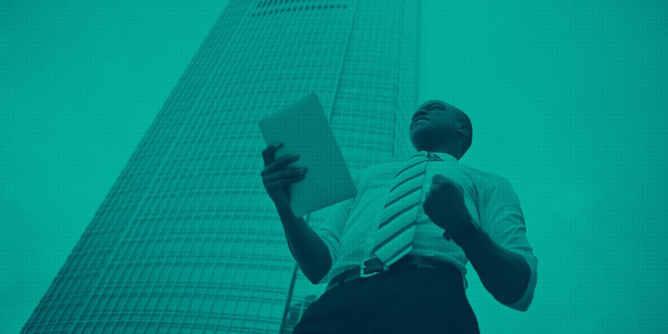 man-standing-with-ipad